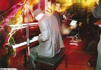 Adam Rudegeair playing piano